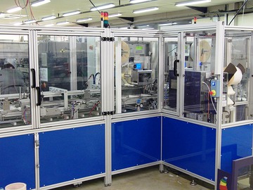 Machine de conditionnement, fermeture boites.