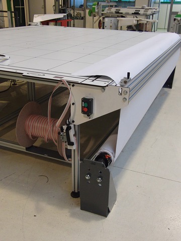 D&eacute;rouleur d'affiche en bobine